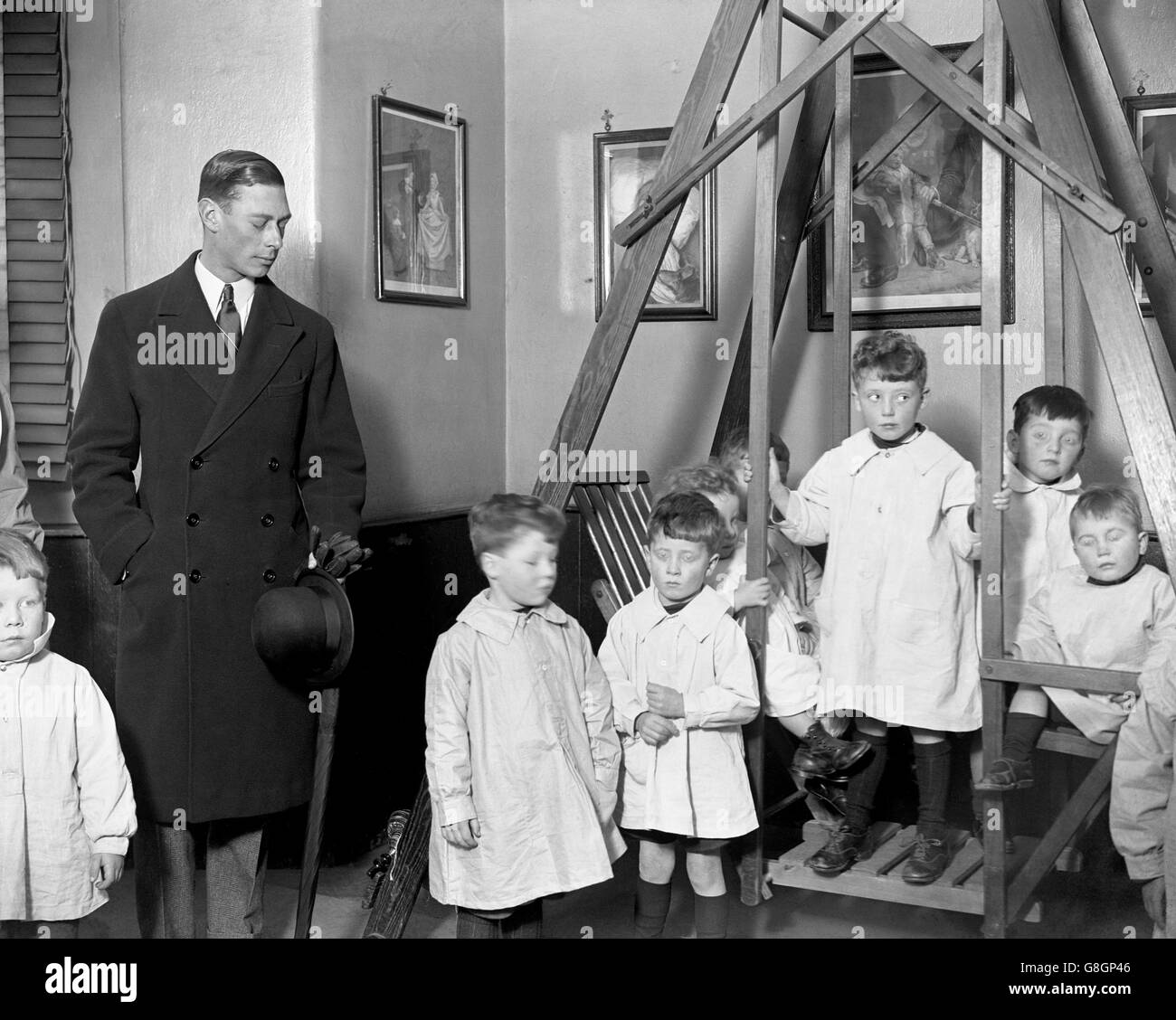 The Duke of York in one of the nurseries at the Orphans Home in Snaresbrook, Essex. Stock Photo