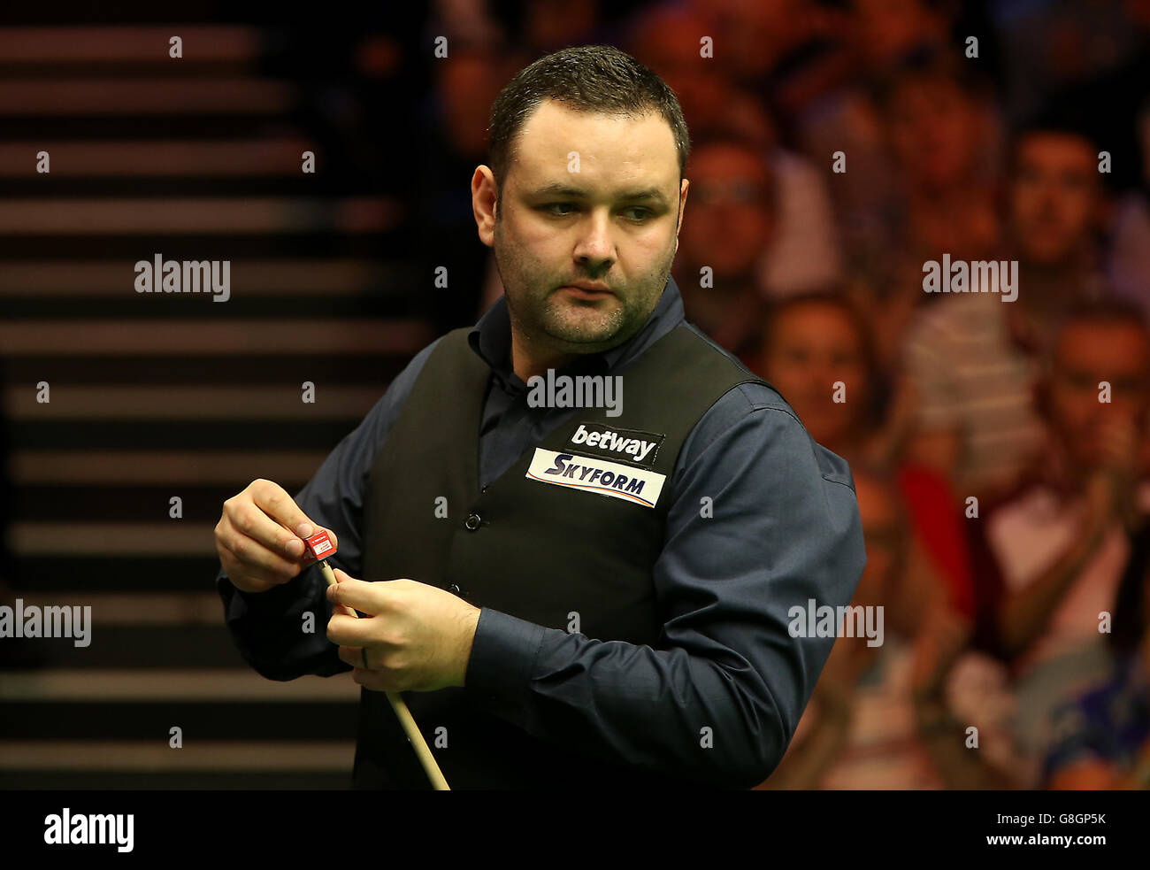 Stephen Maguire in action against Neil Robertson during day nine of the 2015 Betway UK Snooker Championship at The York Barbican, York. Stock Photo