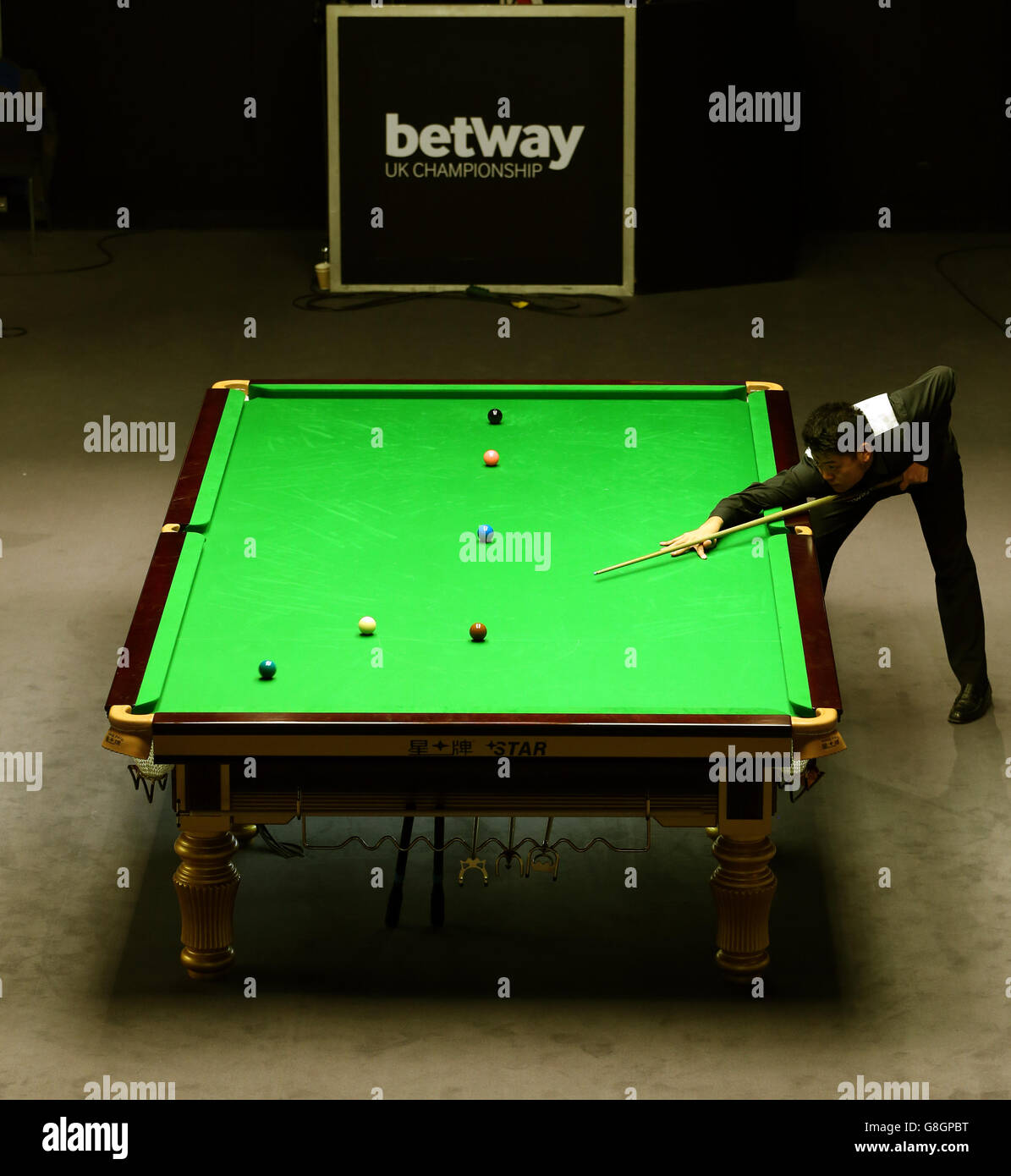 Liang Wenbo in action against Tom Ford during day nine of the 2015 Betway UK Snooker Championship at The York Barbican, York. PRESS ASSOCIATION Photo. Picture date: Thursday December 3, 2015. See PA story SNOOKER York. Photo credit should read: Simon Cooper/PA Wire Stock Photo