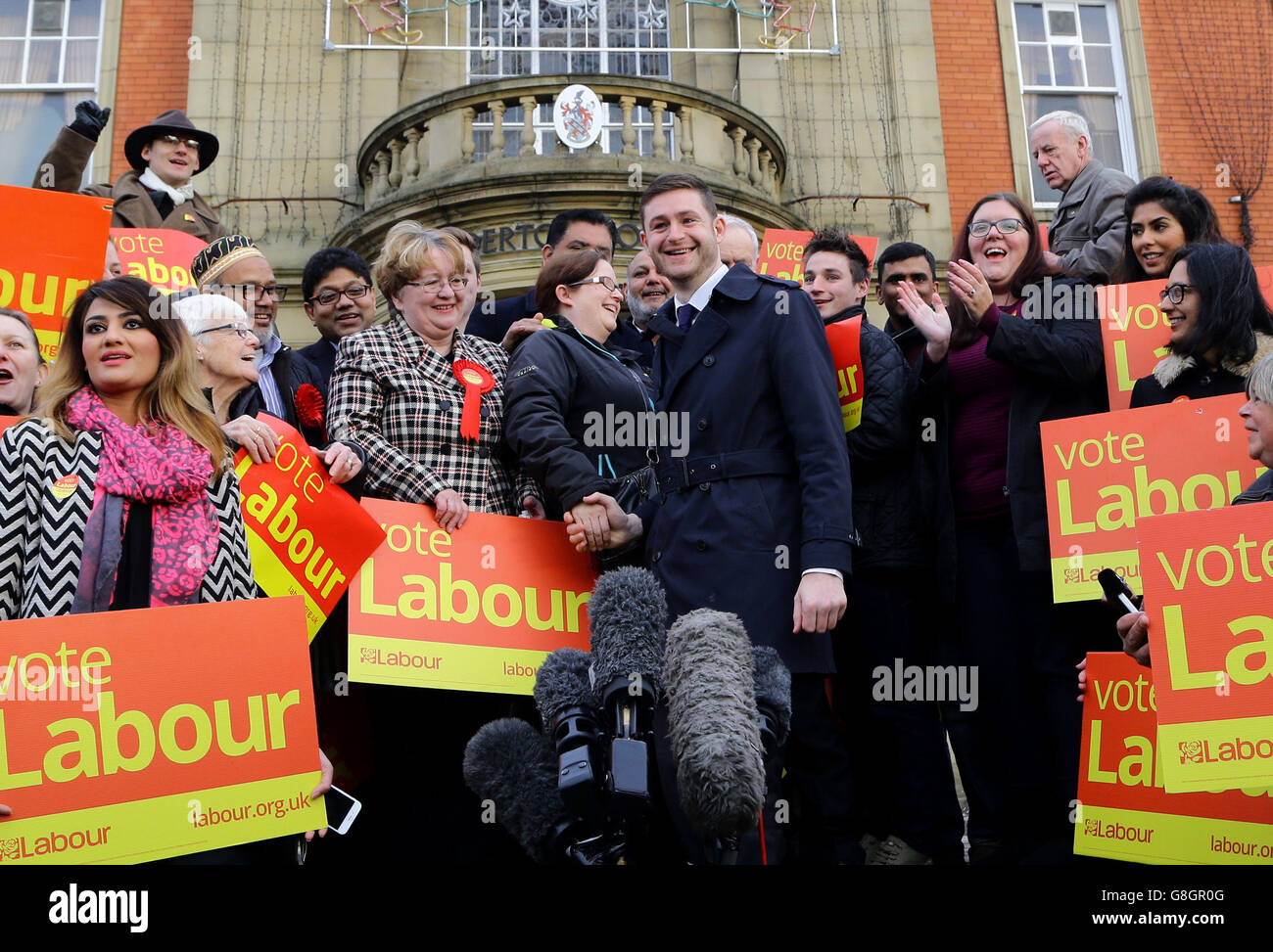 New Labour MP Jim McMahon outside Chadderton Town Hall in Oldham with party supporters, after Labour held the parliamentary by-election seat in Oldham West and Royton with a majority of more than 10,000. Stock Photo