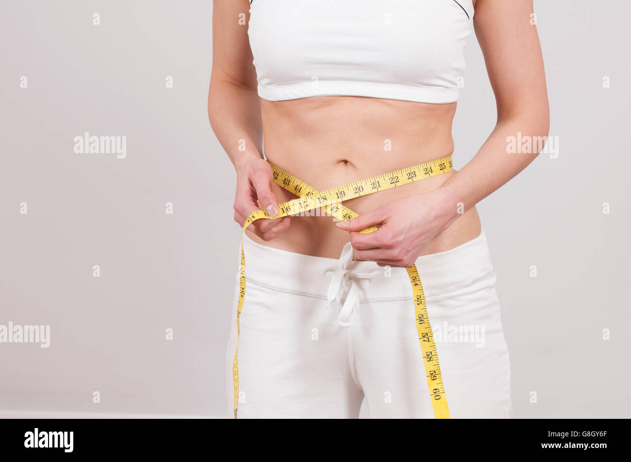 Size Fat Woman Wearing Black Bra Using Tape Measure Check Stock Photo by  ©Voyagerix 448965388