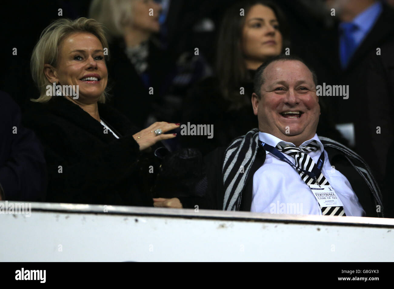 Newcastle United owner Mike Ashley (centre) and wife Linda Ashley (left) watch from the stands during the Barclays Premier League match at White Hart Lane, London. Stock Photo
