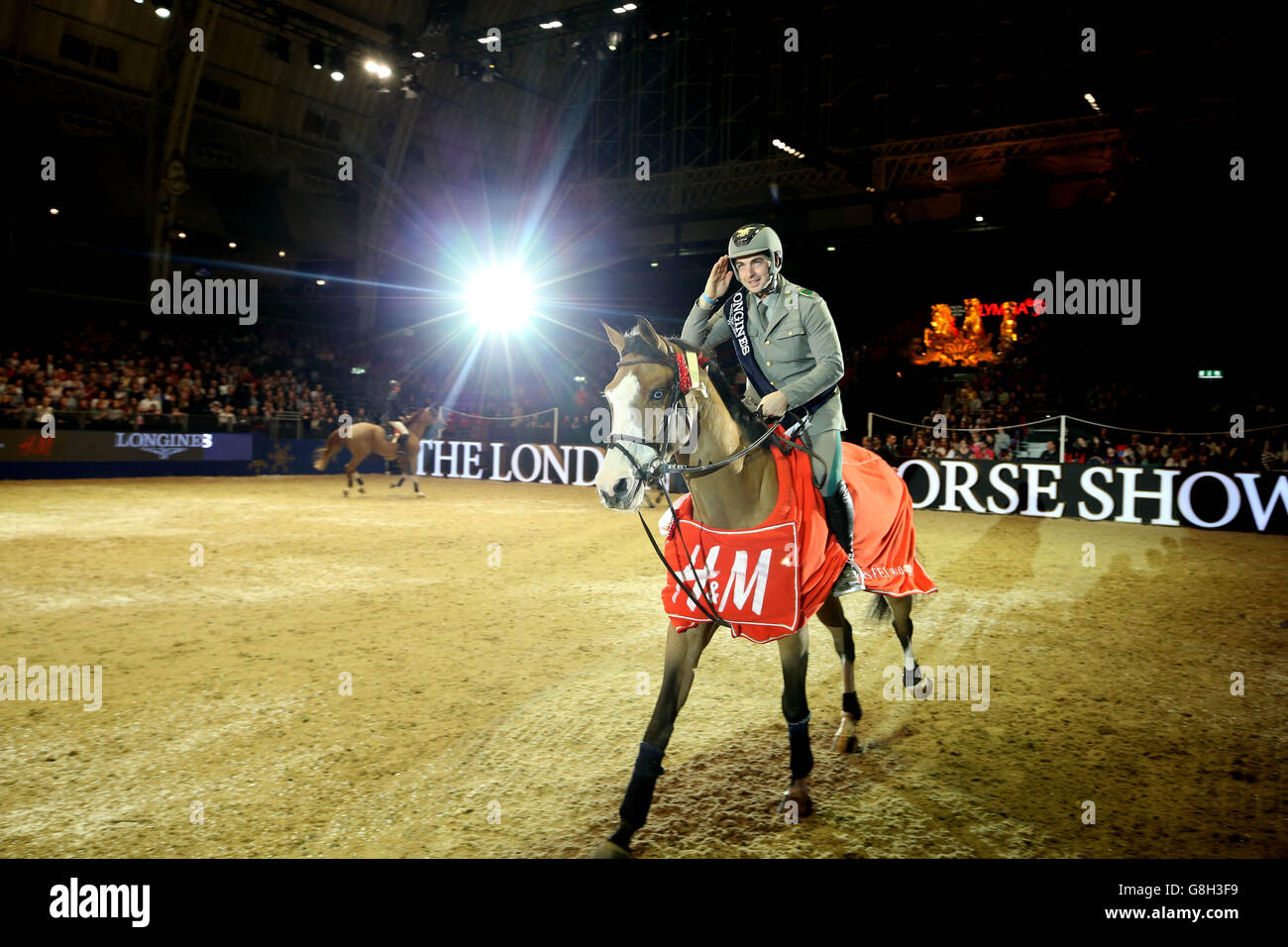 Italy's Emanuele Gaudiano riding Admara wins the Longines FEI World Cup during day six of the Olympia London International Horse Show at the Olympia Exhibition Centre, London. Stock Photo