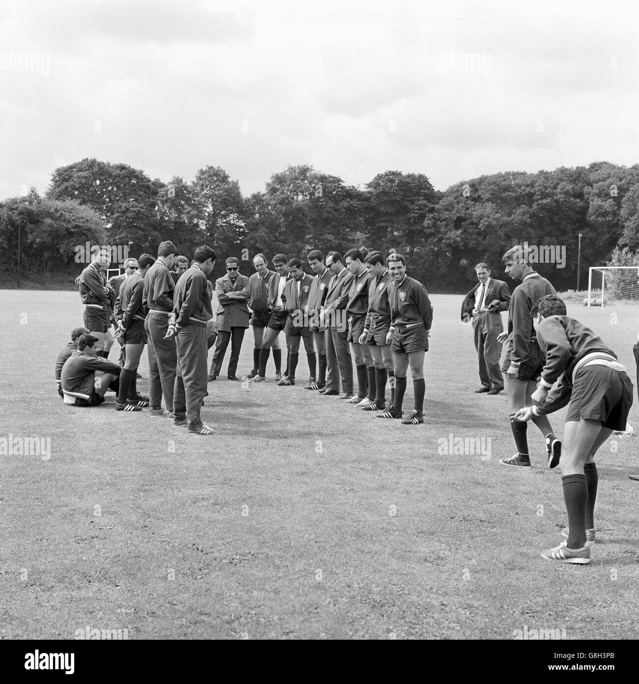 Mexico players take time out from training for a game of 'The Line', their version of the game known in Britain as Pitch and Toss Stock Photo