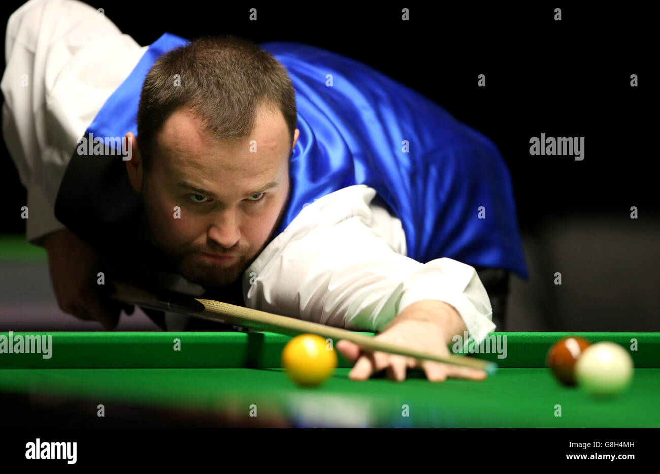 Mark Joyce during his match against Dechawat Poomjaeng during day seven of the 2015 Betway UK Snooker Championship at The York Barbican, York. Stock Photo
