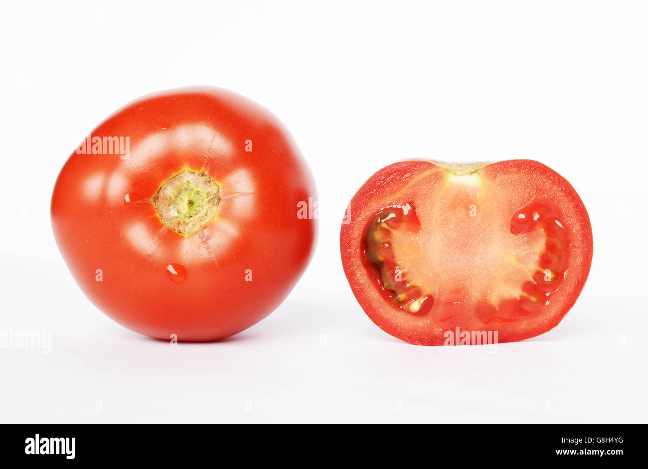Twoo Fresh Tomatoes isolated on white background Stock Photo