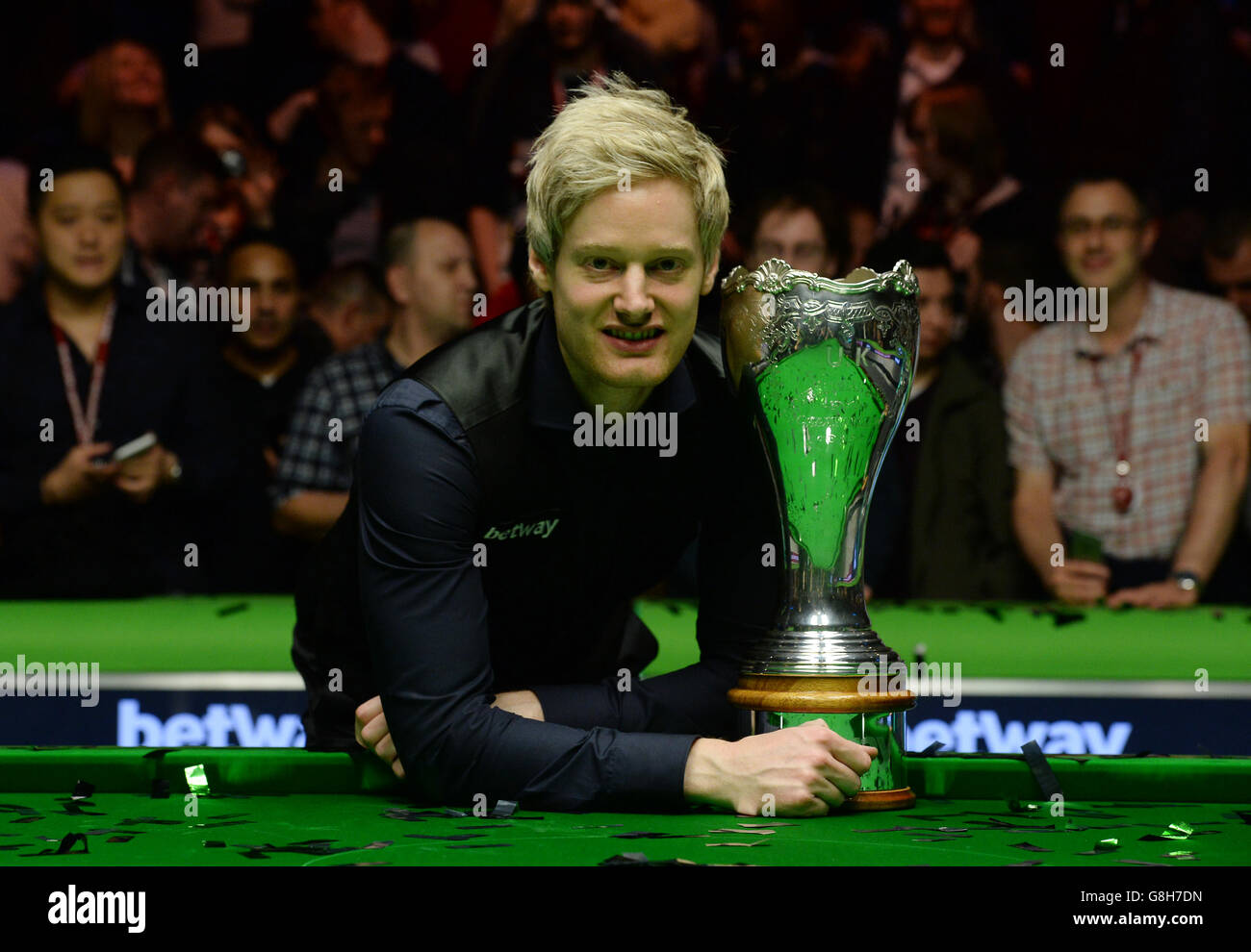 Neil Robertson celebrates with the trophy after winning the final match against Liang Wenbo during day twelve of the 2015 Betway UK Snooker Championship at The York Barbican, York. Stock Photo