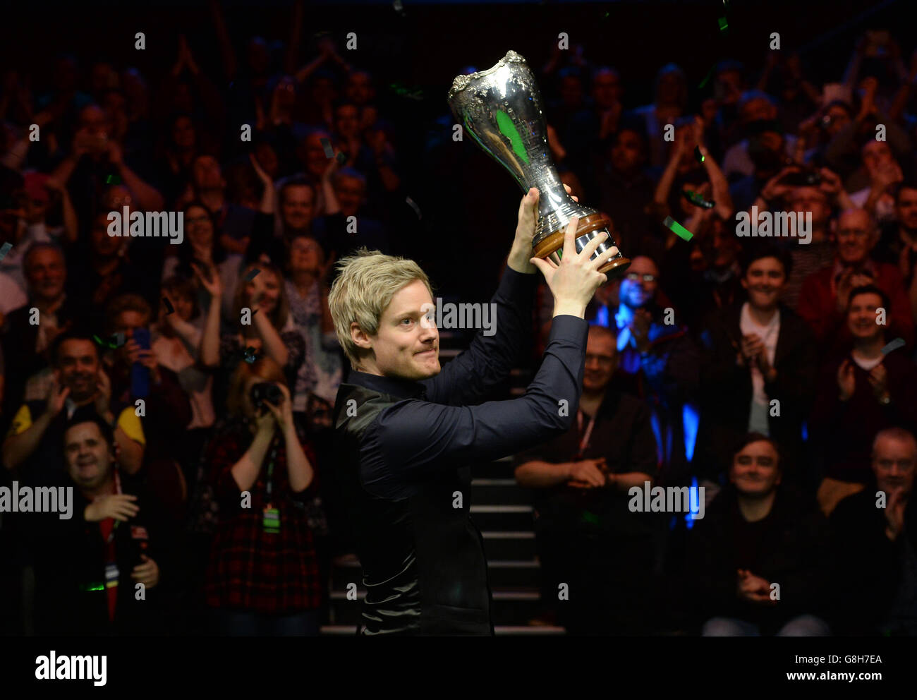 Neil Robertson celebrates with the trophy after winning the final match against Liang Wenbo during day twelve of the 2015 Betway UK Snooker Championship at The York Barbican, York. Stock Photo