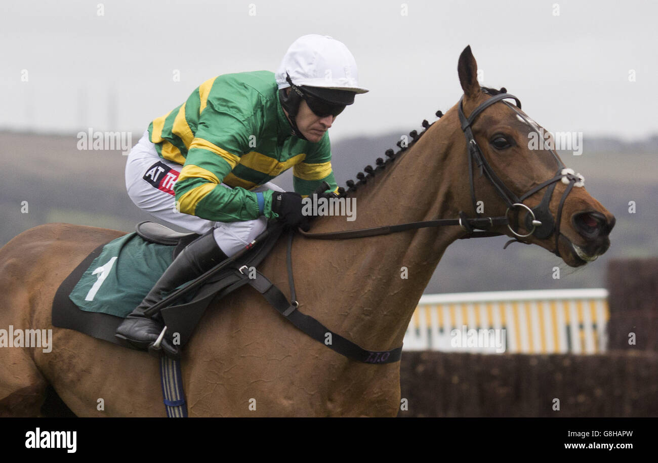More Of That ridden by Barry Geraghty pulls away from an early fence before going on to win The Raymond Mould Memorial Novices' Steeple Chase Race run during day two of The International at Cheltenham Racecourse. Stock Photo