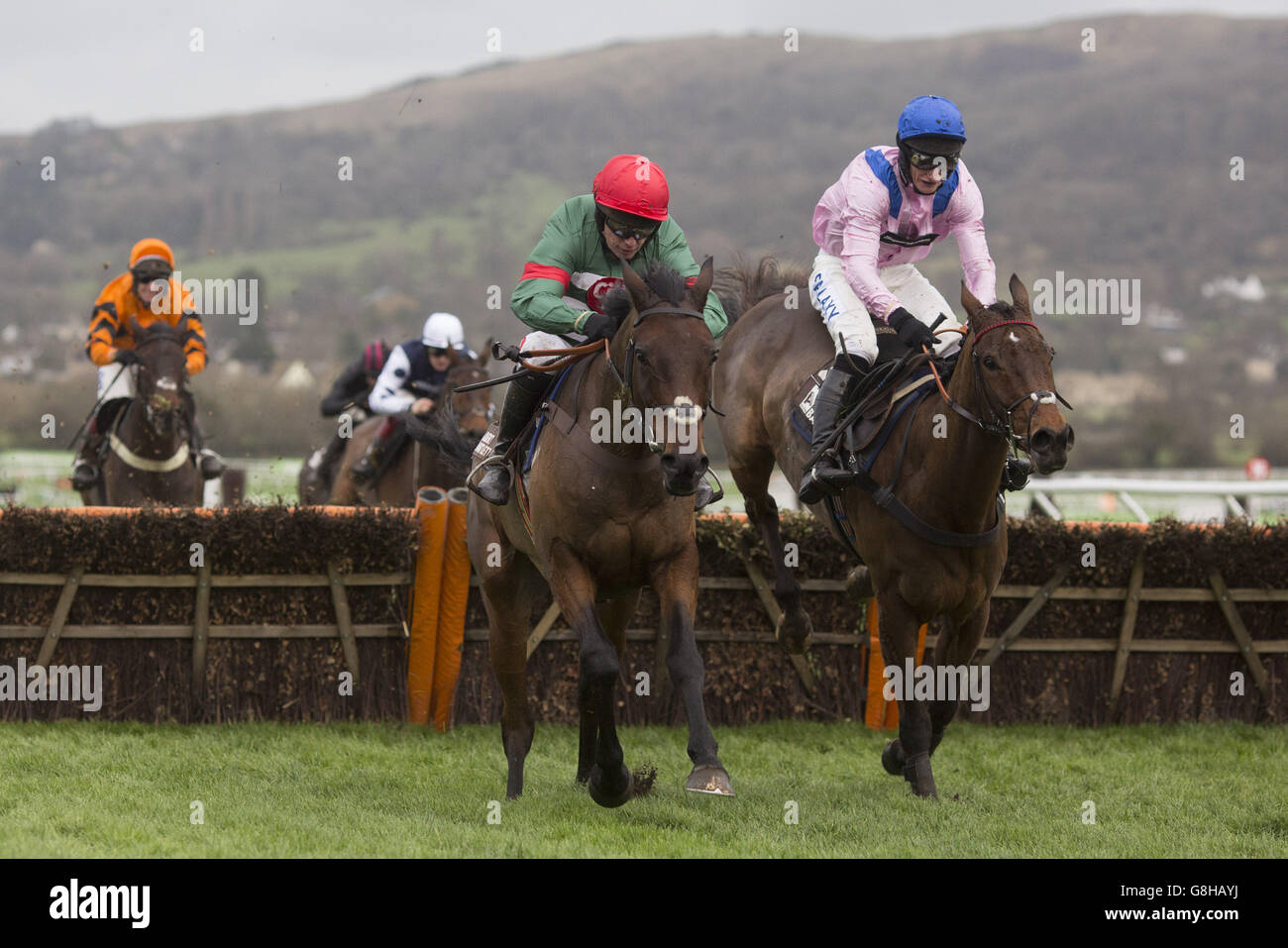Unowhatimeanharry ridden by Noel Fehily (left) gets the better of Final Nudge ridden by Daryl Jacob before going on to win The Albert Bartlett Novices' Hurdle Race run during day two of The International at Cheltenham Racecourse. Stock Photo