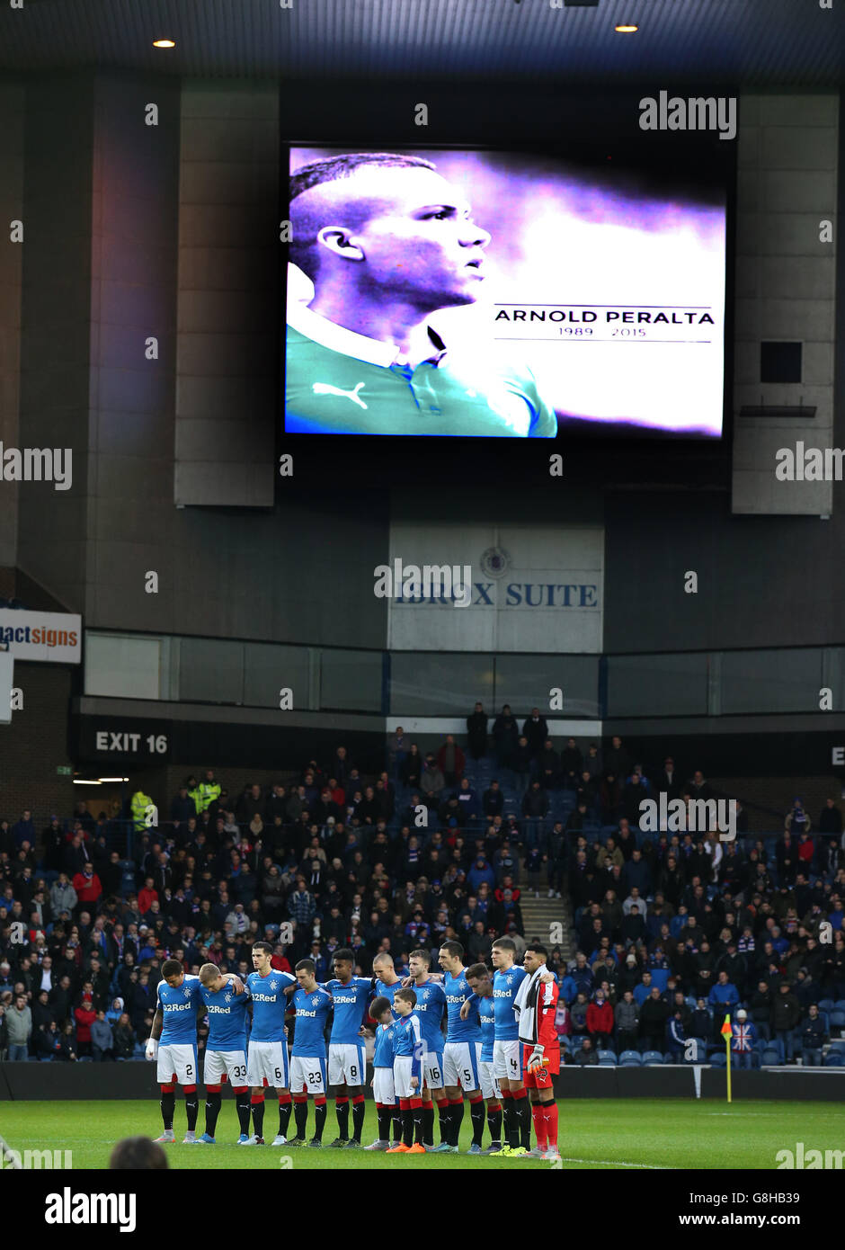A minutes silence is held after the death of former Rangers player Arnold Peralta before the Ladbrokes Scottish Championship match at the Ibrox Stadium, Glasgow. Stock Photo