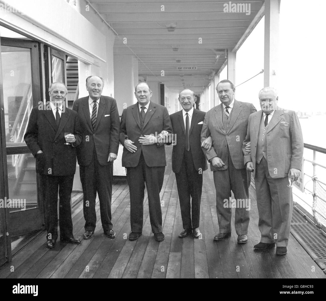 A wealthy line-up on the deck of the liner Windsor Castle at Southampton. They were sailing for South Africa. (l-r) Lieut-Col FL Orme, OBE, TD, Chairman of Royal Insurance, Sir John Reiss, Chairman of Associated Portland Cement and other companies, Owen Aisher, Chairman of the Marley Group, Jack Cohen, Chairman and founder of Tesco stores, Viscount Cobham, KG, GCMG, TD, Chairman of Cerebos and other companies, and FN Sutherland, CBE, Chairman of the Marconi Company. Stock Photo