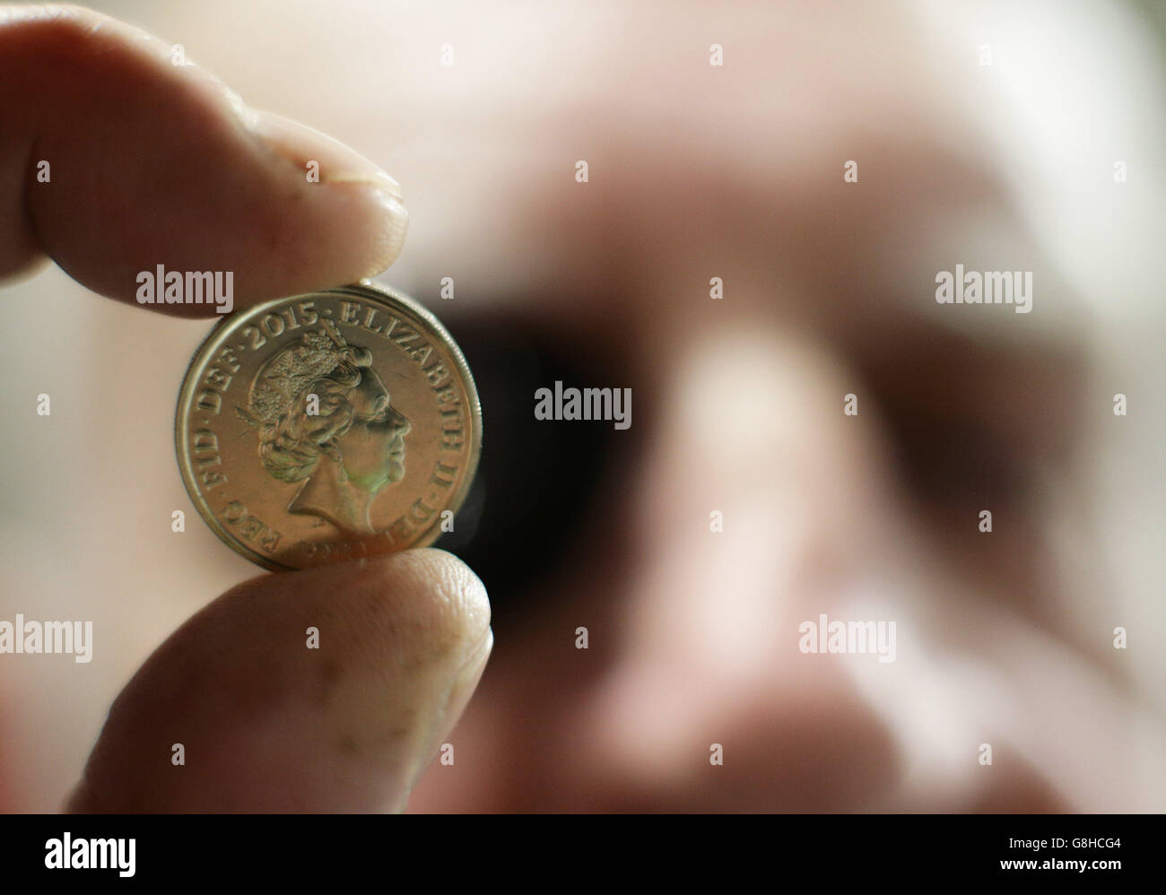 Royal Mint coin press setter John Jones, who was working in the