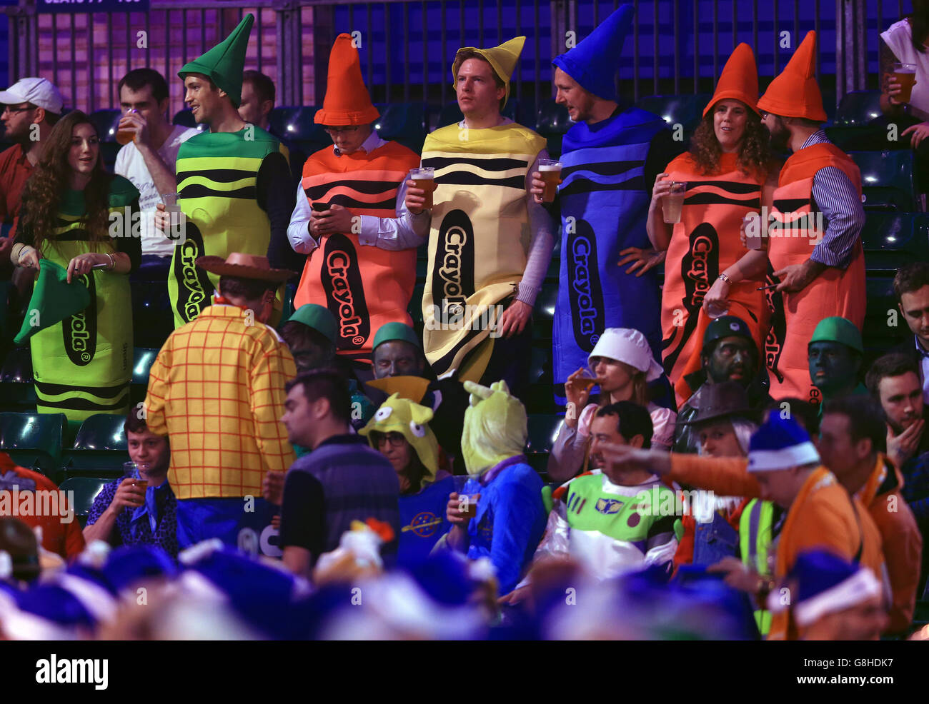 Darts fans dressed as Crayons during day one of the William Hill PDC World  Championship at Alexandra Palace, London Stock Photo - Alamy
