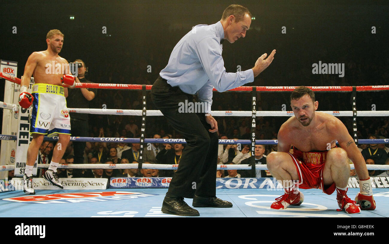 Andy Lee faces the count from the referee after being knocked down by Billy Joe Saunders during their WBO World Middleweight title match at Manchester Arena. Stock Photo