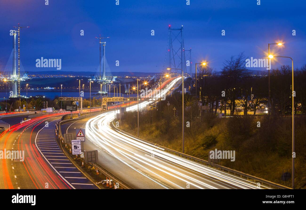 EDS NOTE: LONG EXPOSURE USED Cars drive over the Forth Road Bridge near Edinburgh in Scotland, as it reopens after interim repairs were completed ahead of schedule. Stock Photo