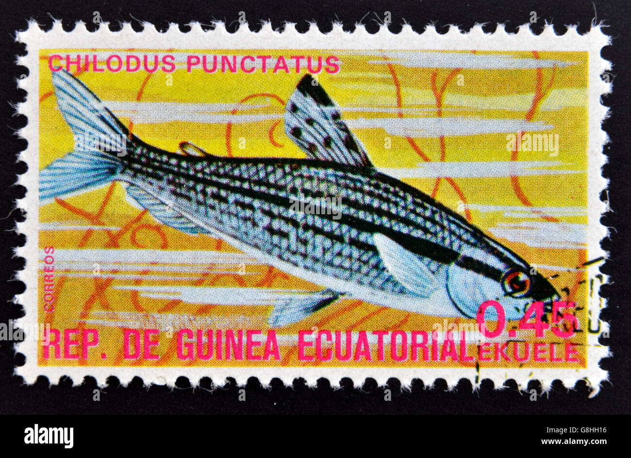 EQUATORIAL GUINEA - CIRCA 1974: A stamp printed in Guinea Ecuatorial dedicated to exotic fish shows chilodus punctatus, circa 19 Stock Photo