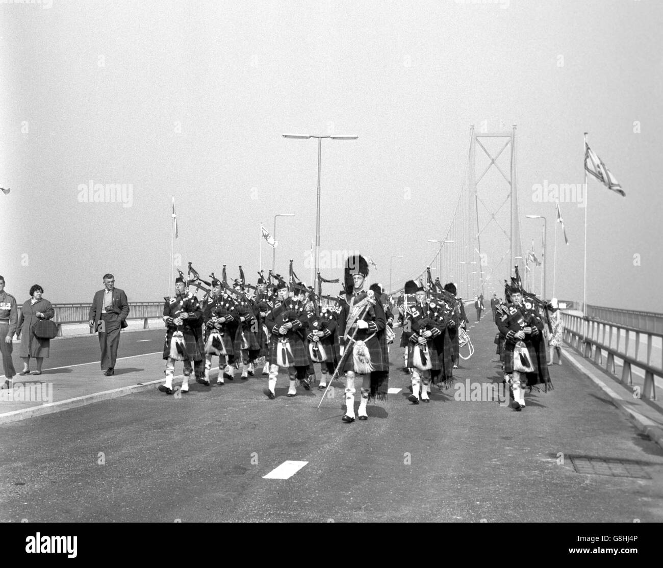 20million Forth Road Bridge after it had been opened by Queen Elizabeth II. The Queen and Prince Philip were the first to drive across the bridge, which spans the River Forth and provides a link between Edinburgh and Fife. Stock Photo