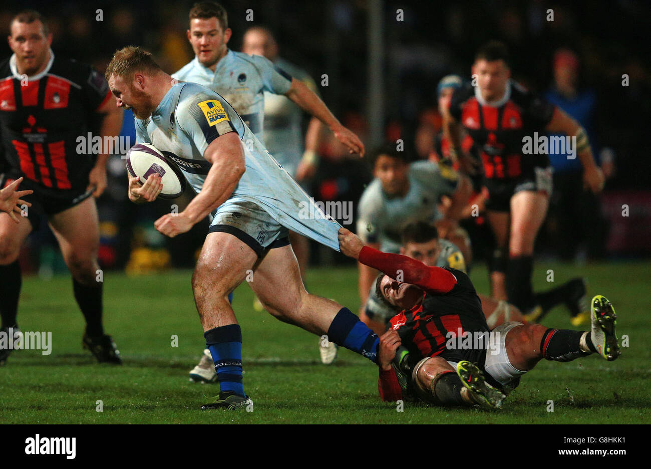 Worcester's Mike Daniels is tackled by Gloucester's Henry Trinder during the European Challenge Cup match at Sixways Stadium, Worcester. Stock Photo