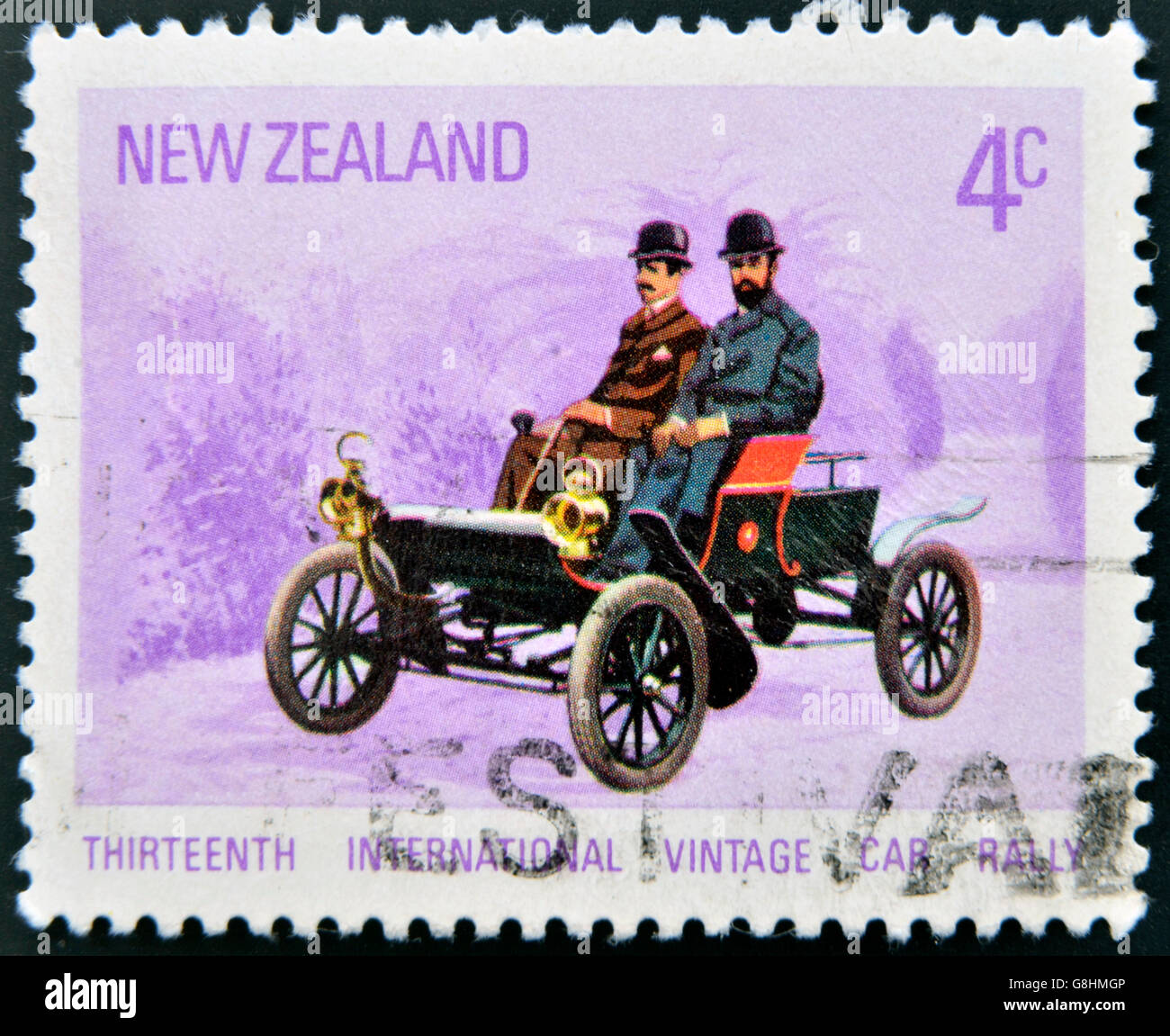 NEW ZEALAND - CIRCA 1972: A stamp printed in New Zealanddedicated to Thirteenth International Vintage Car Rally shows Oldsmobile Stock Photo