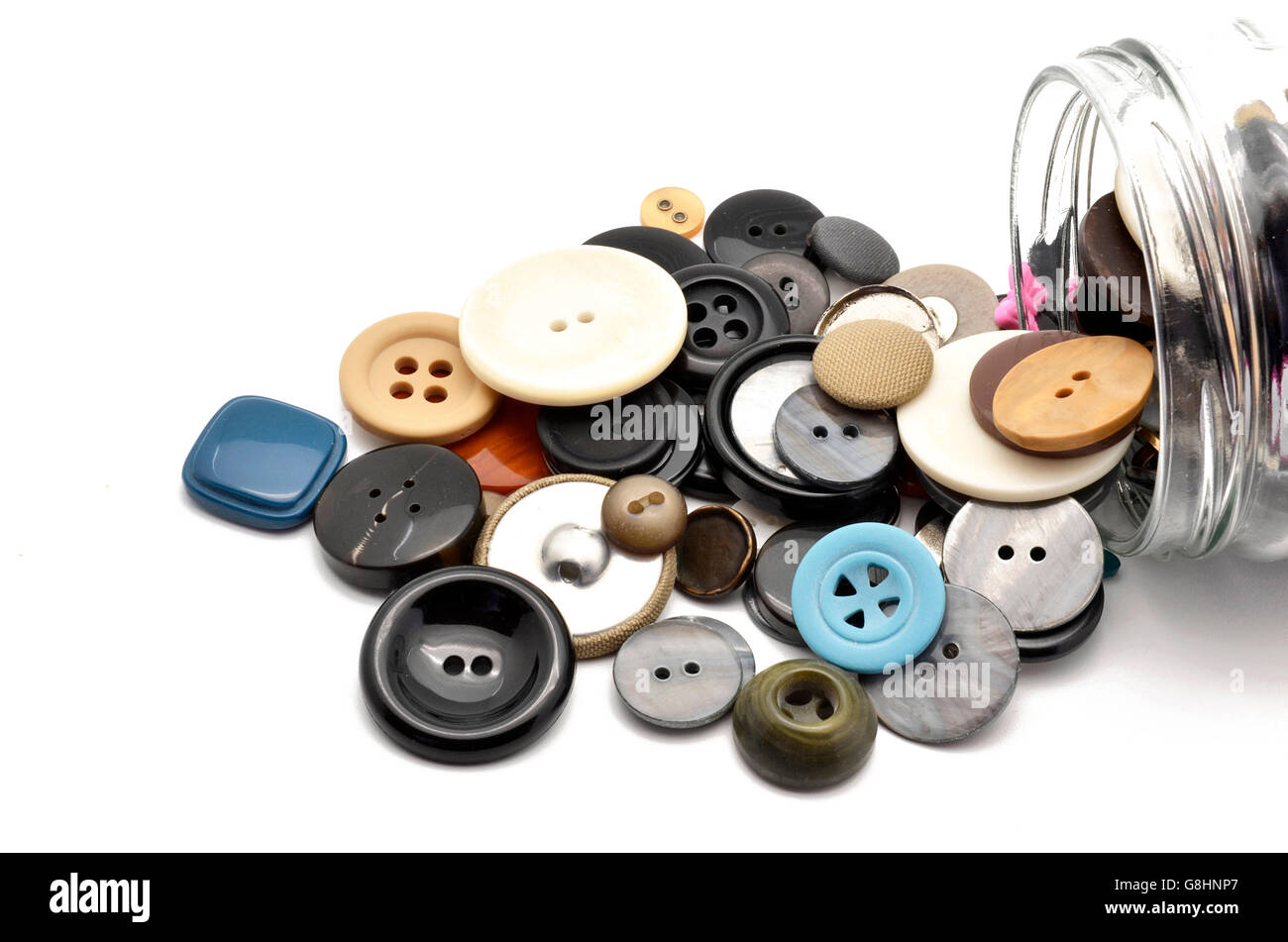 sewing buttons out of a boat Stock Photo - Alamy