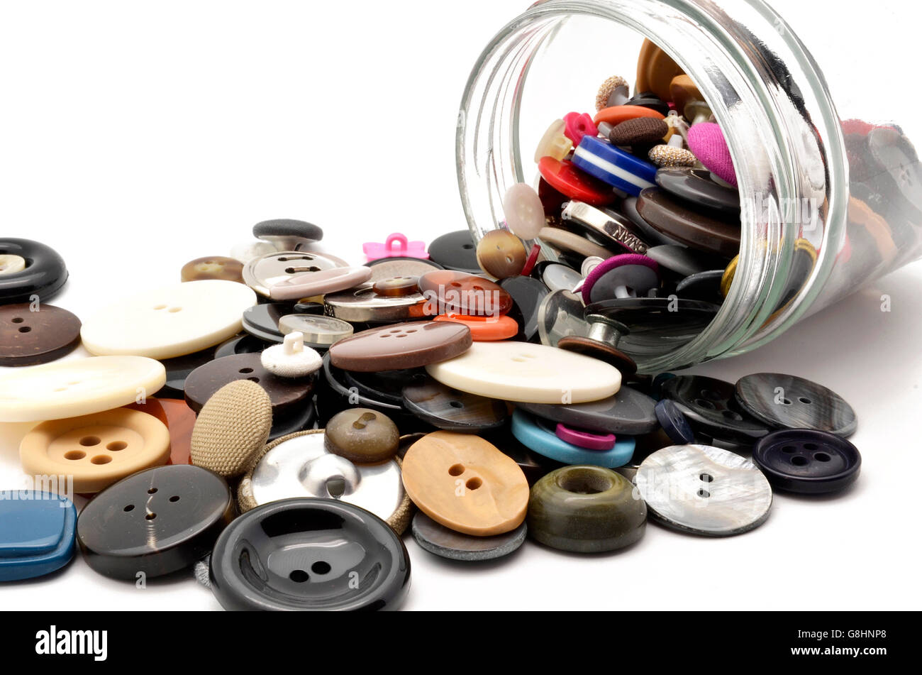 sewing buttons out of a boat Stock Photo - Alamy