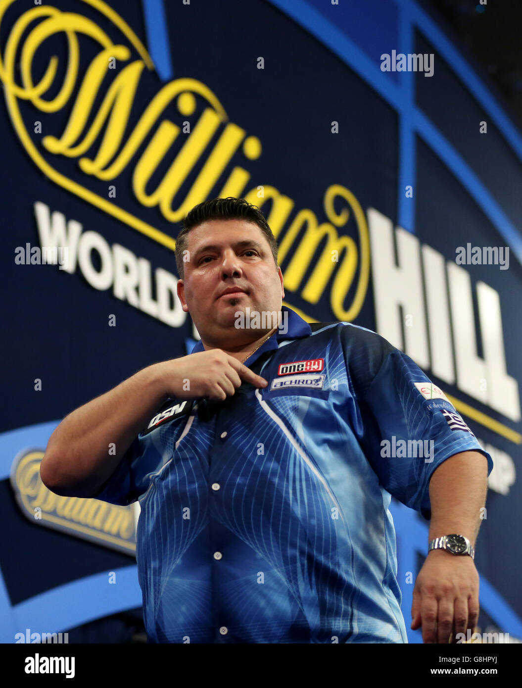 John Michael reacts during his match with Warrick Scheffer during day five of the William Hill PDC World Championship at Alexandra Palace, London. PRESS ASSOCIATION Photo. Picture date: Monday December 21, 2015. See PA story DARTS World. Photo credit should read: Simon Cooper/PA Wire. Use subject to restrictions. No commercial use. Stock Photo