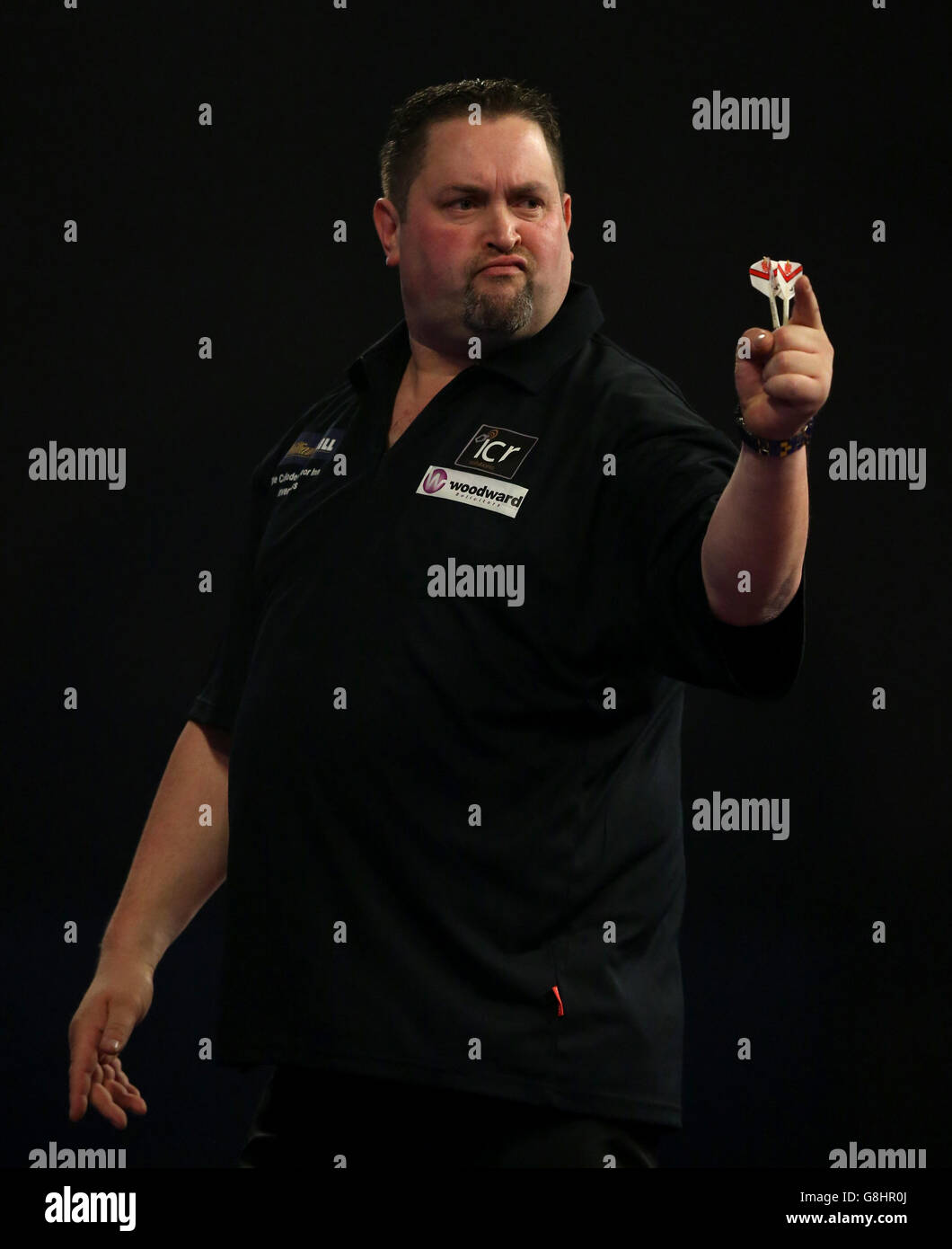 Alan Norris reacts during his match with Robert Thornton during day five of the William Hill PDC World Championship at Alexandra Palace, London. PRESS ASSOCIATION Photo. Picture date: Monday December 21, 2015. See PA story DARTS World. Photo credit should read: Simon Cooper/PA Wire. Stock Photo
