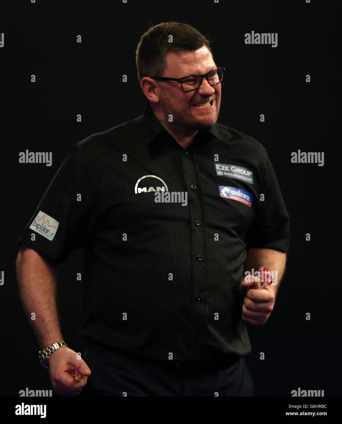 James Wade reacts during his match with John Michael during day five of the William Hill PDC World Championship at Alexandra Palace, London. PRESS ASSOCIATION Photo. Picture date: Monday December 21, 2015. See PA story DARTS World. Photo credit should read: Simon Cooper/PA Wire. Stock Photo