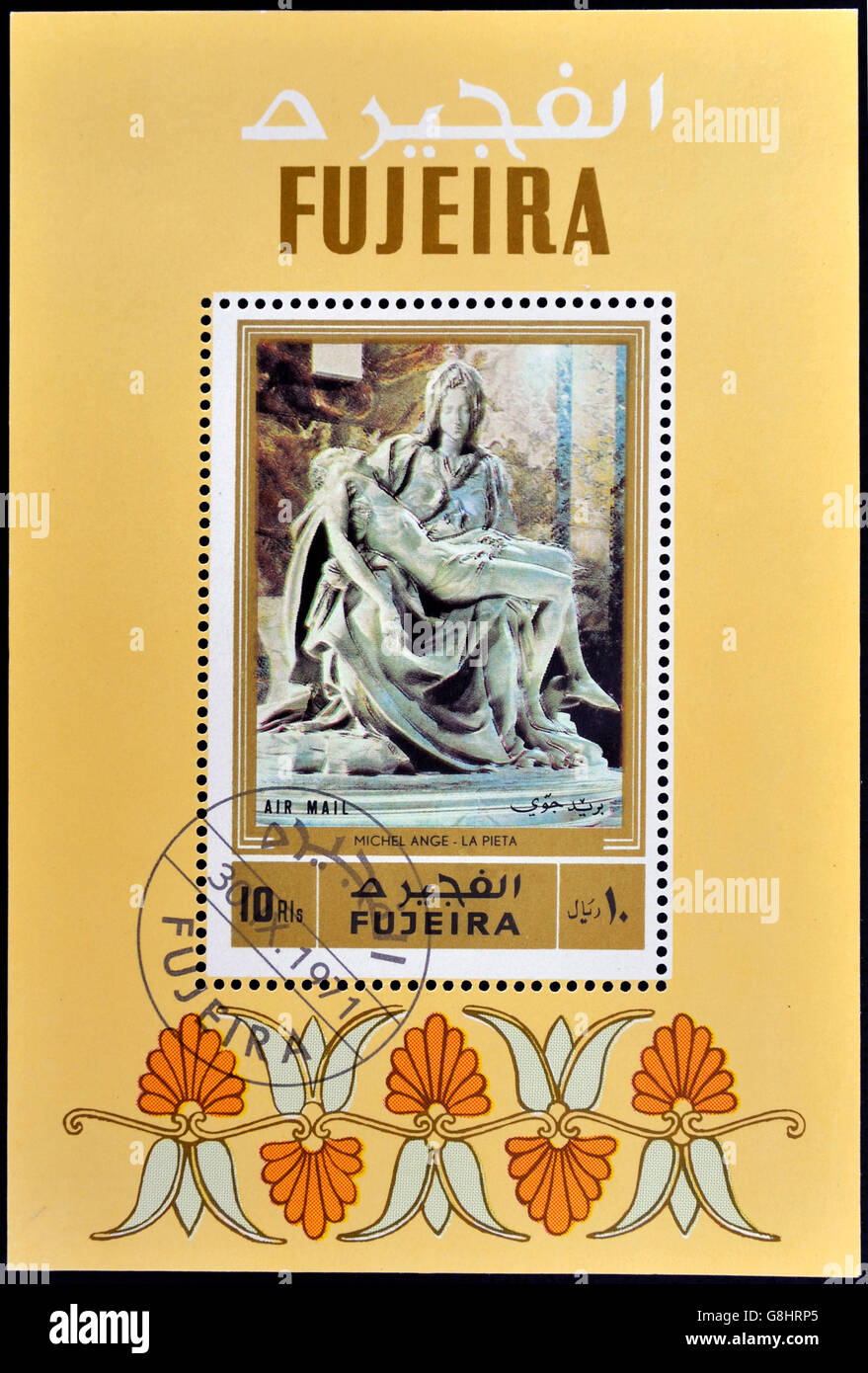 FUJEIRA - CIRCA 1971: A stamp printed in Fujeira shows The Pieta by Michelangelo, circa 1971 Stock Photo