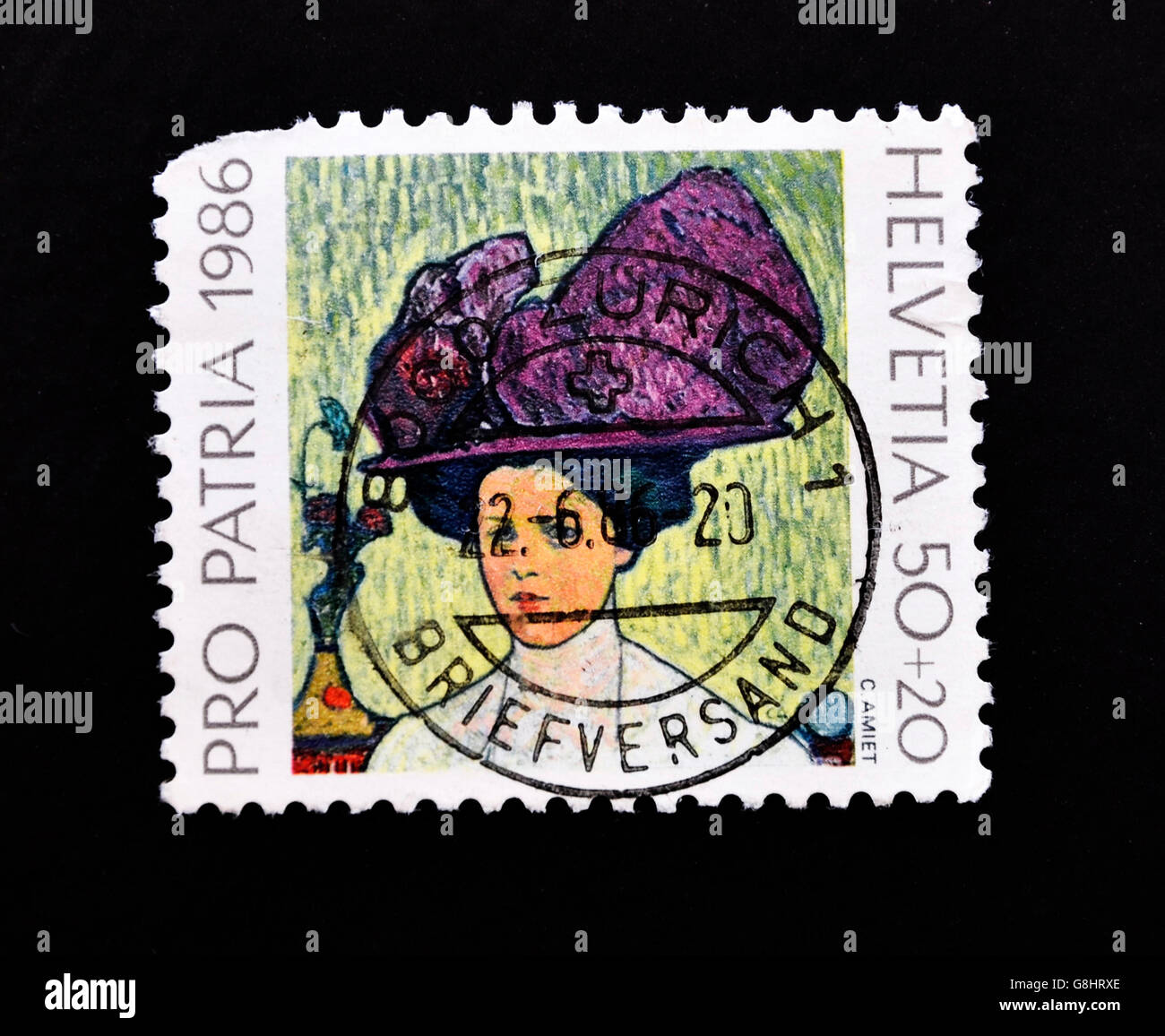 SWITZERLAND - CIRCA 1986: A stamp printed in Switzerland showing the painting of a woman wearing a hat made by the painter C. Am Stock Photo