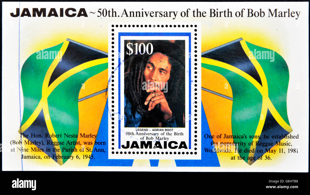 JAMAICA - CIRCA 1995: A stamp printed in Jamaica commemorating the 50th anniversary of the birth of Bob Marley, circa 1995 Stock Photo