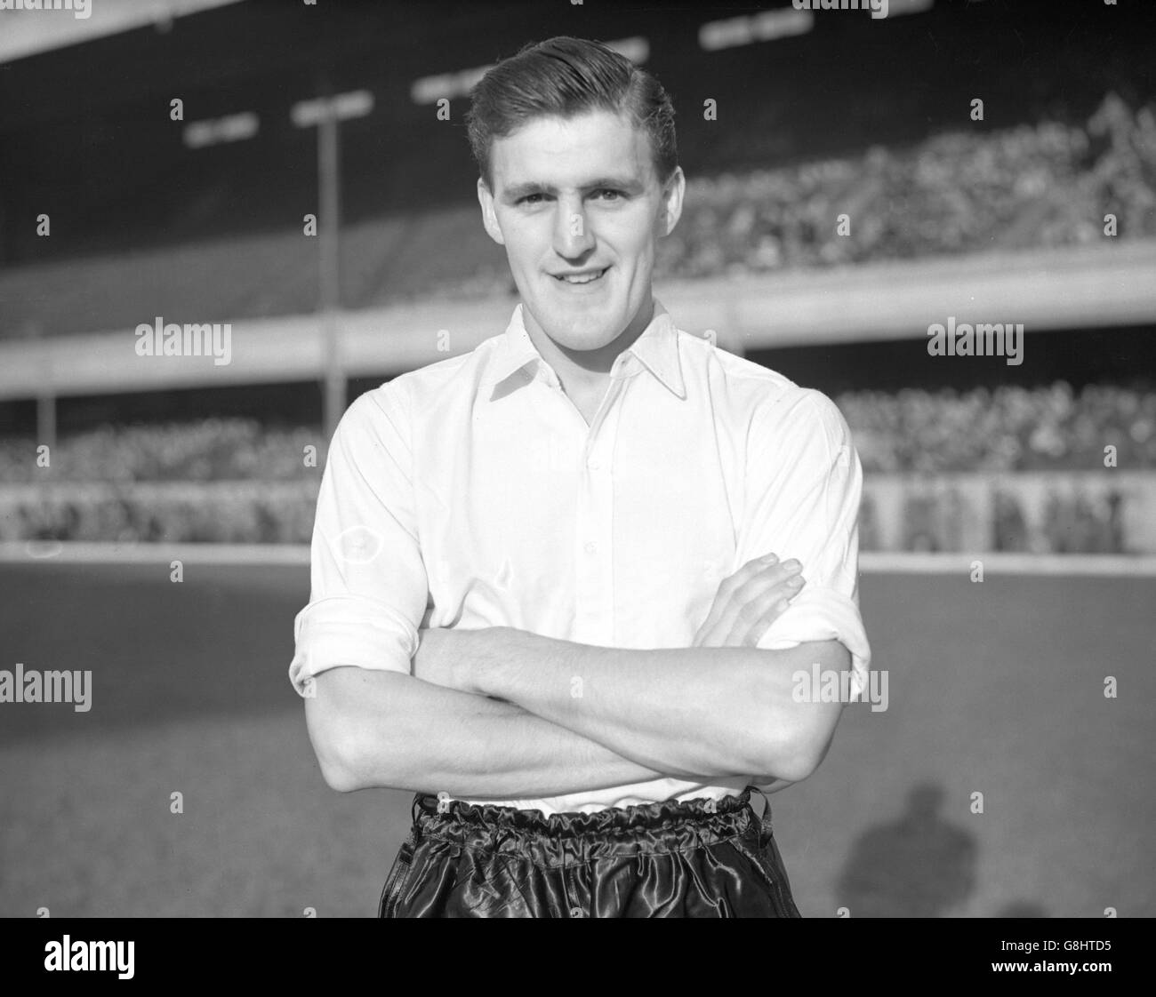 Jimmy Hill, the smiling left-half of Brentford Football Club, whose stylish play has helped the team into the Second Division limelight. Stock Photo