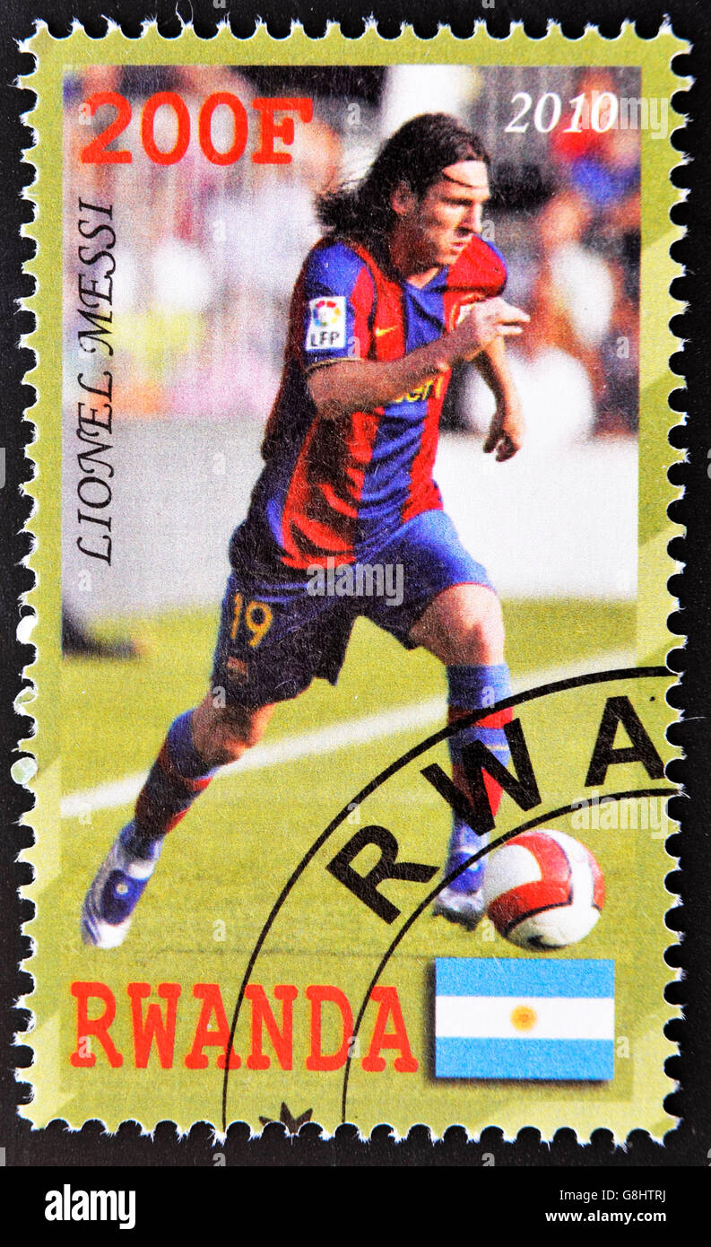 Visit Rwanda Messi RWANDA - CIRCA 2010: A stamp printed in Rwanda shows showing lionel ...
