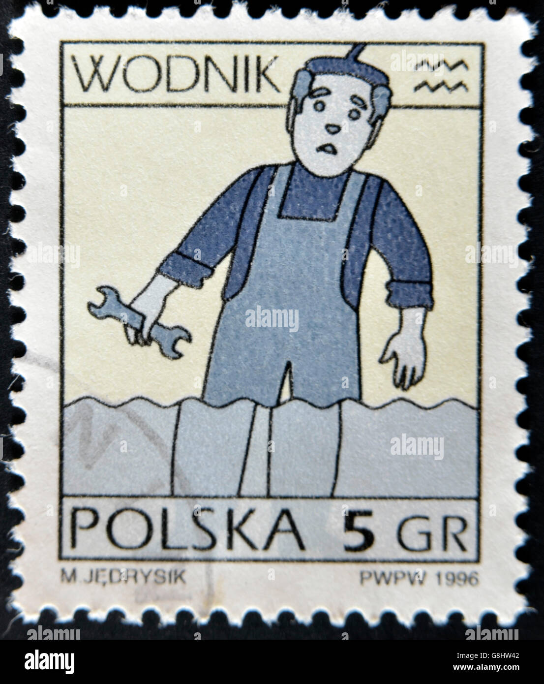 POLAND -CIRCA 1996: A stamp printed in Poland shows Zodiac signs, aquarius, circa 1996. Stock Photo