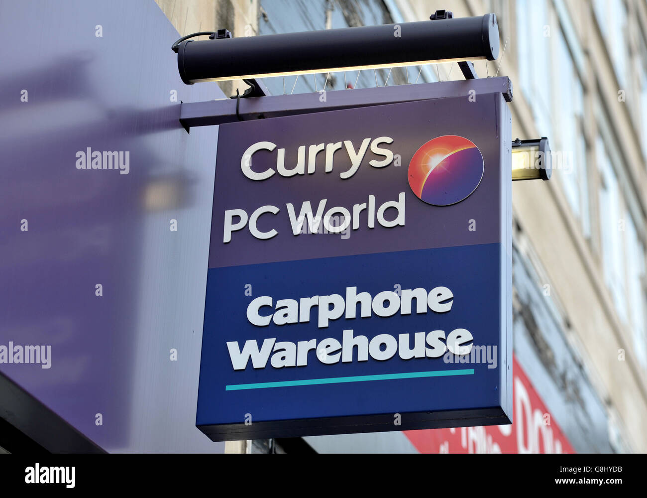 A shop sign for Currys PC World and Carphone Warehouse in central
