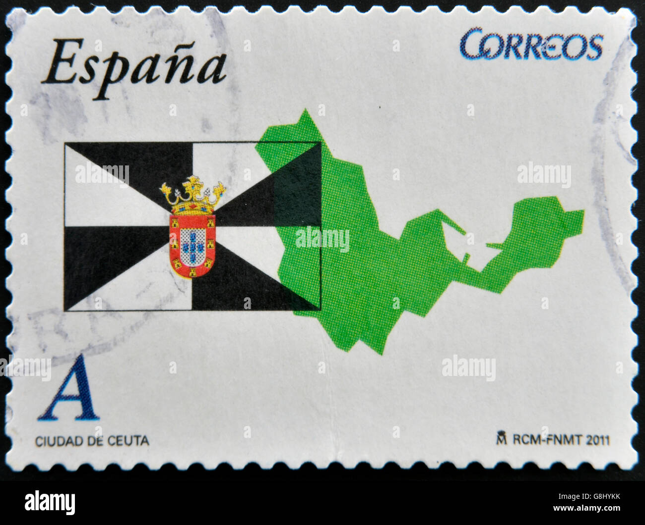 SPAIN - CIRCA 2011: A stamp printed in spain shows flag and map of the autonomous city of Ceuta, circa 2011 Stock Photo