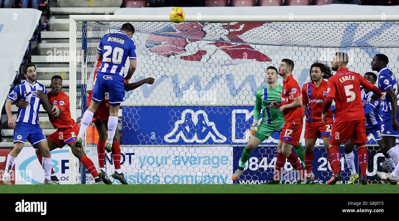 Wigan Athletic's Craig Morgan scores his team's third goal of the game ...