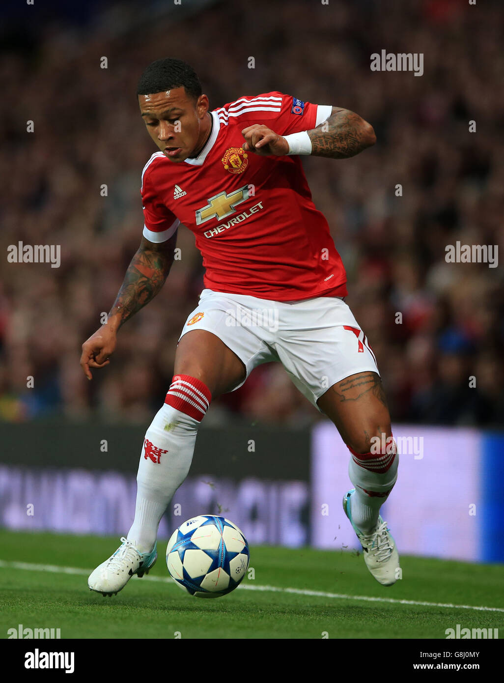 Soccer - UEFA Champions League - Qualifying - Play-off - Manchester United v Club Brugge - Old Trafford. Manchester United's Memphis Depay Stock Photo