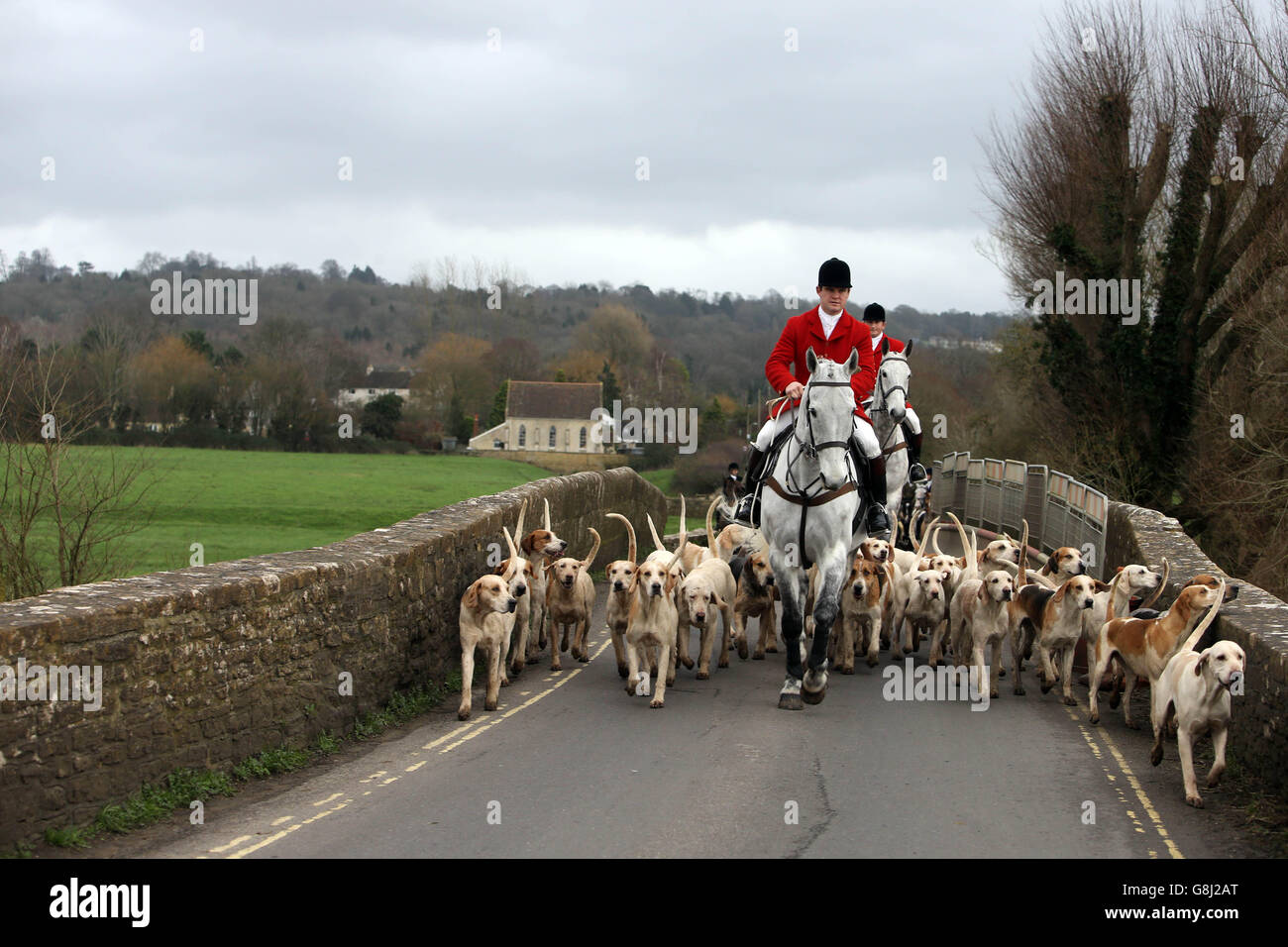 The Avon Vale Hunt meet in the village of Lacock in Wiltshire for the annual Boxing Day hunt. Stock Photo