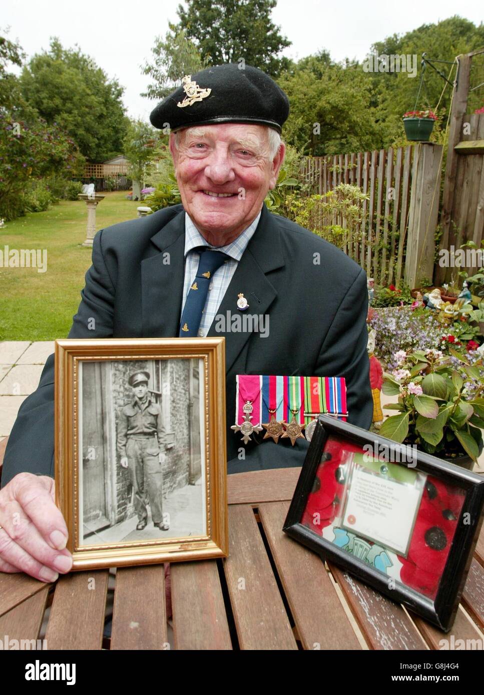 George Housego, 84, at his home. George Housego, was captured in Java while a gunner with the Royal Artillery. He was placed on a notorious Japanese Hellship transporter and while on passage to Singapore, the ship was sunk by a US warplane. 'I managed to survive and after 12 hours of freedom I was picked up by a Jap fishing boat and turned in. I was then taken to Nagasaki and then on to another camp somewhere.' Stock Photo