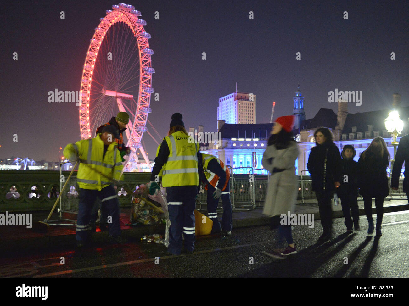 The clean-up begins in central London after the New Year celebration ...