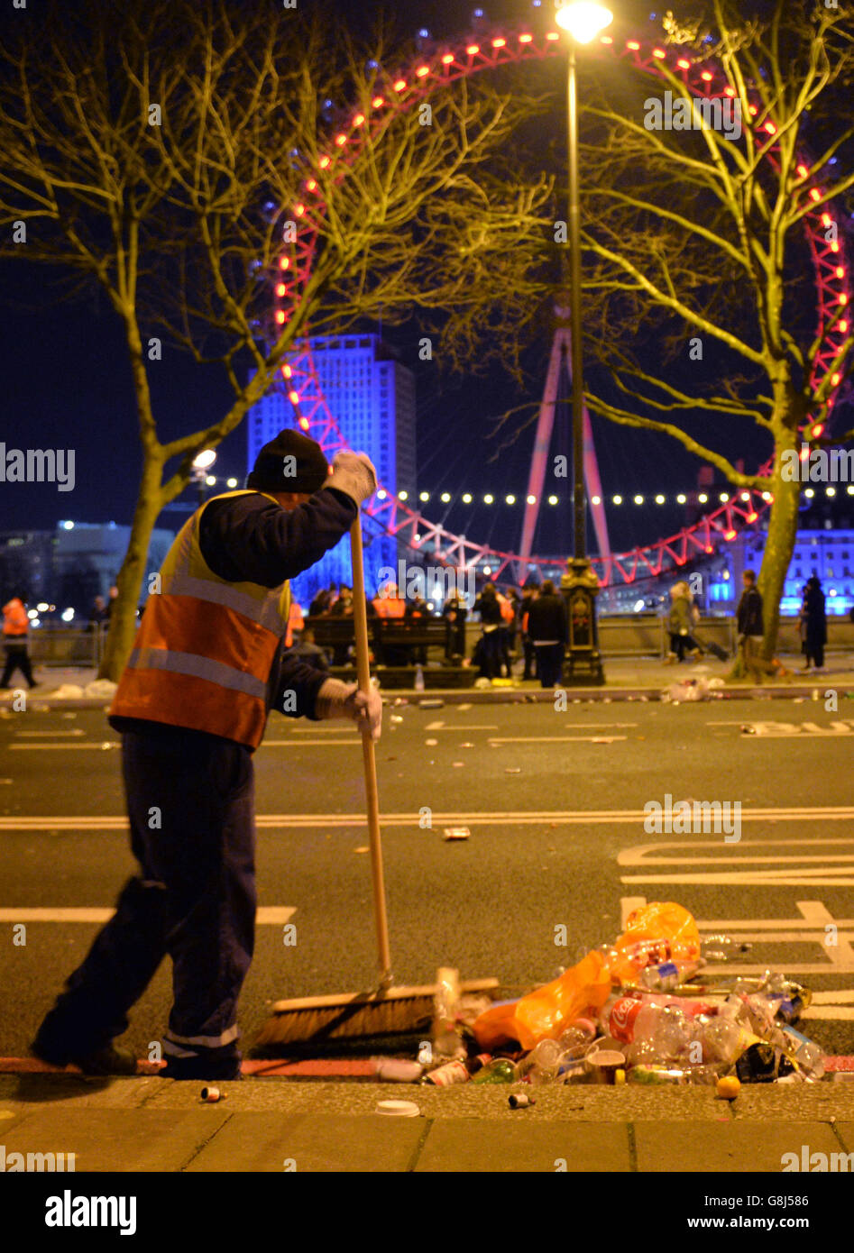 The clean-up begins in central London after the New Year celebration ...
