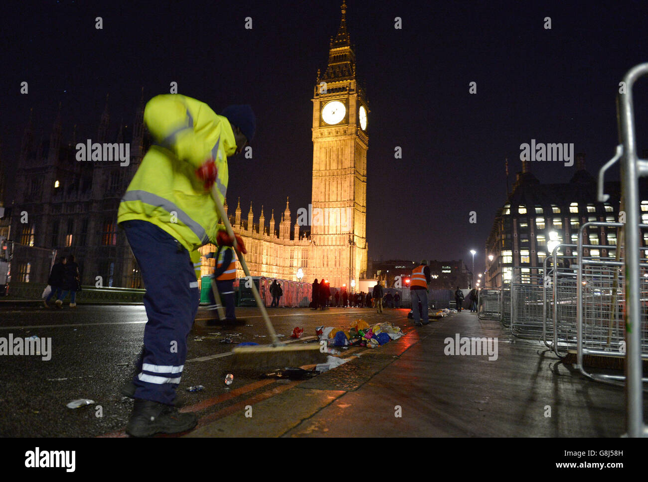 The clean-up begins in central London after the New Year celebration ...