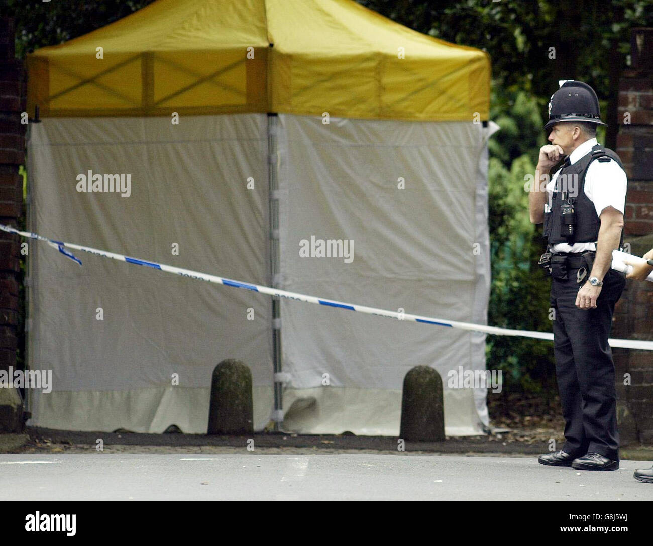 The scene at a park in Huyton, after an 18 year old black man was attacked and killed with an axe late last night. Just minutes earlier he had been racially abused while waiting for a bus with his girlfriend and a male relative, both 17. A Merseyside Police spokesman said: 'This was a totally unprovoked and racially motivated attack.' Stock Photo