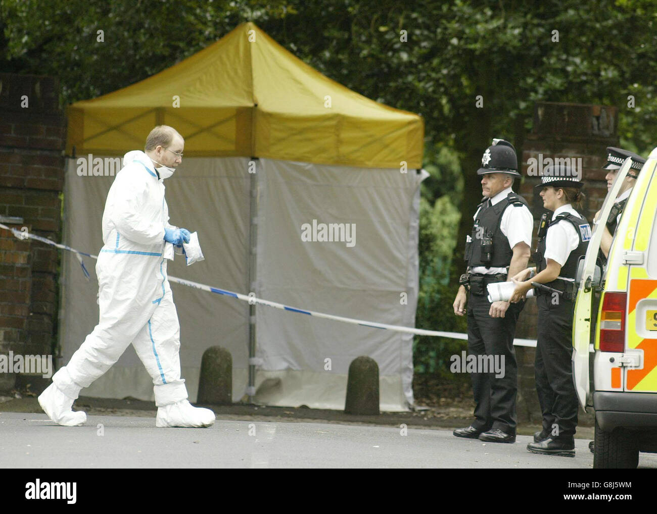 The scene at a park in Huyton, after an 18 year old black man was attacked and killed with an axe late last night. Just minutes earlier he had been racially abused while waiting for a bus with his girlfriend and a male relative, both 17. A Merseyside Police spokesman said: 'This was a totally unprovoked and racially motivated attack.' Stock Photo