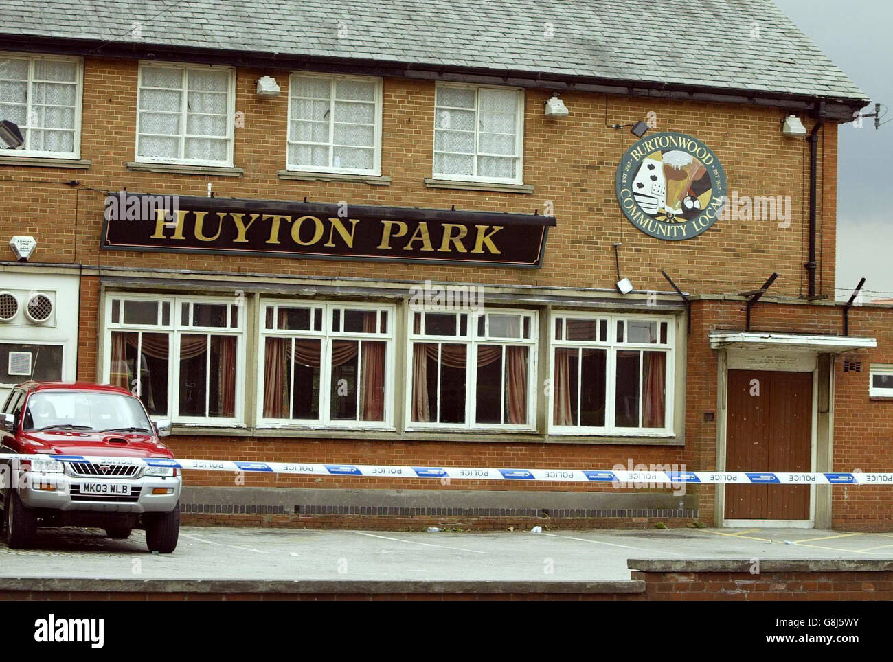 The scene at a park in Huyton, after an 18 year old black man was attacked and killed with an axe late last night. Just minutes earlier he had been racially abused while waiting for a bus with his girlfriend and a male relative, both 17. A Merseyside Police spokesman said: 'This was a totally unprovoked and racially motivated attack.' Stock Photo