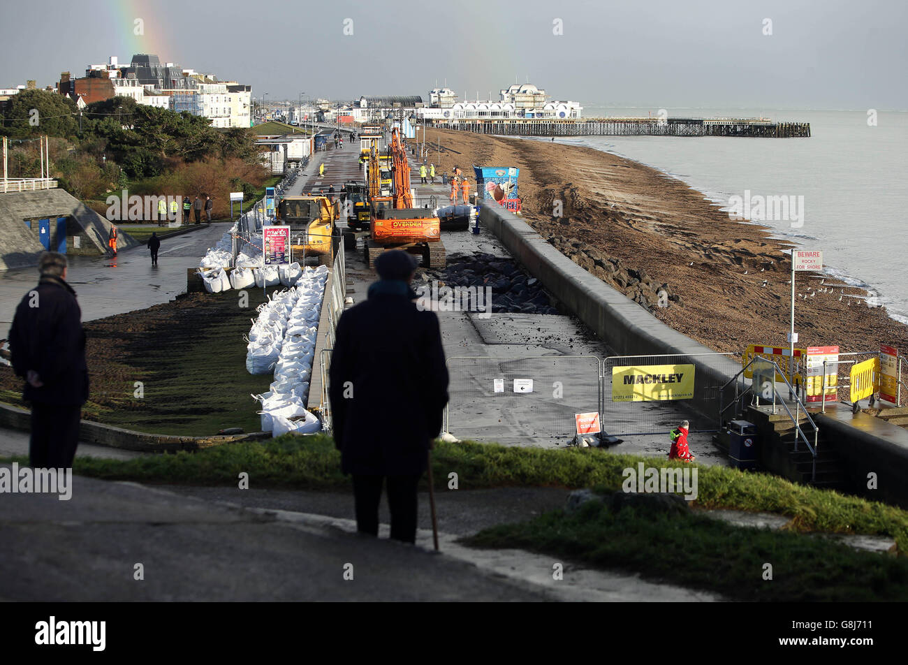 Repairs continue to the sea wall in Southsea, Hampshire after the recent storms have cause a hole in the sea wall. Stock Photo