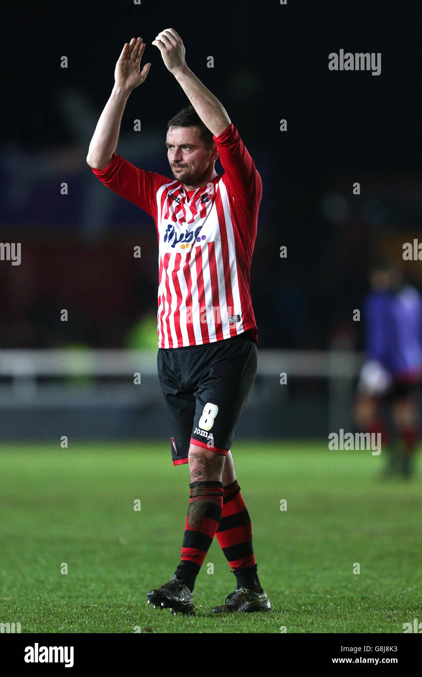 Exeter City v Liverpool - Emirates FA Cup - Third Round - St James Park. Exeter City's Matt Oakley applauds the fans after the final whistle during the Emirates FA Cup, third round match at St James Park, Exeter. Stock Photo