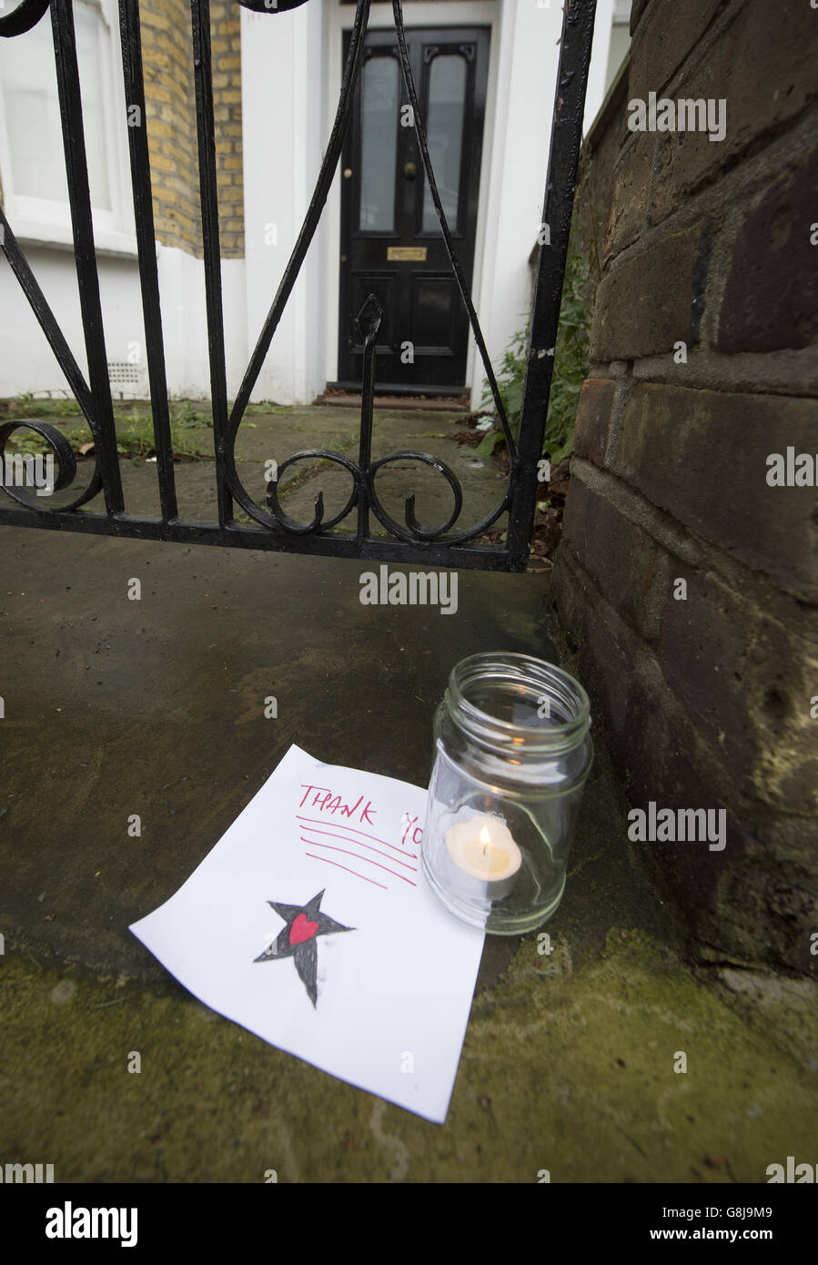 Tributes are left outside 40 Stansfield Road, Brixton, London, the